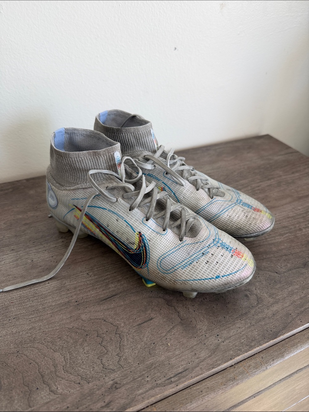 Nike Gray High-Top Soccer Cleats with Multicolor Accents
